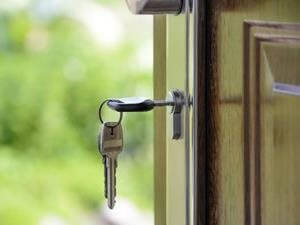 An open door with keys inside to a house obtained with the help of a mortgage prequalification.