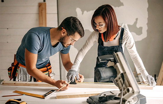 Couple working on home improvements