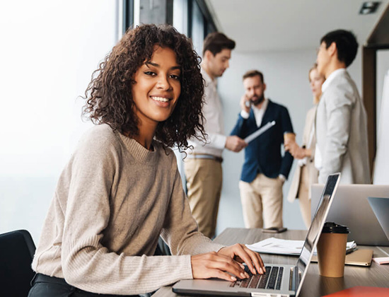woman in office with computer