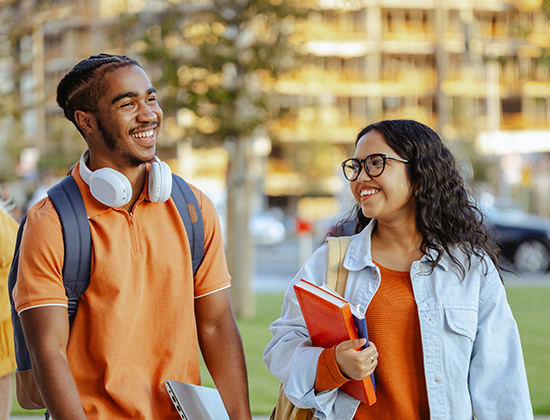 diverse students walking on campus