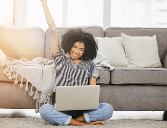 happy woman with laptop