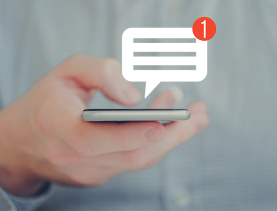 Male hand getting text alerts about banking accounts on mobile phone