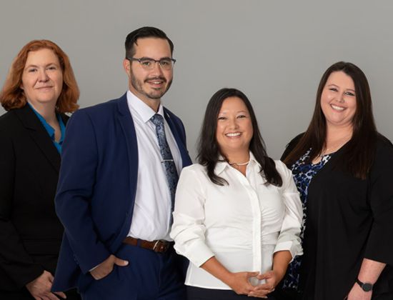 Photo of four Southeast Trust employees