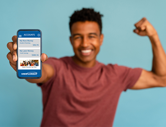 Teen male holding up cell phone with Student Checking Account on screen