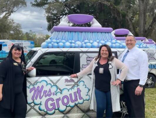 Business member, Mrs. Grout