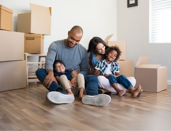 happy family moving boxes
