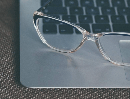 Glasses on Laptop Get $300 with new Business Checking